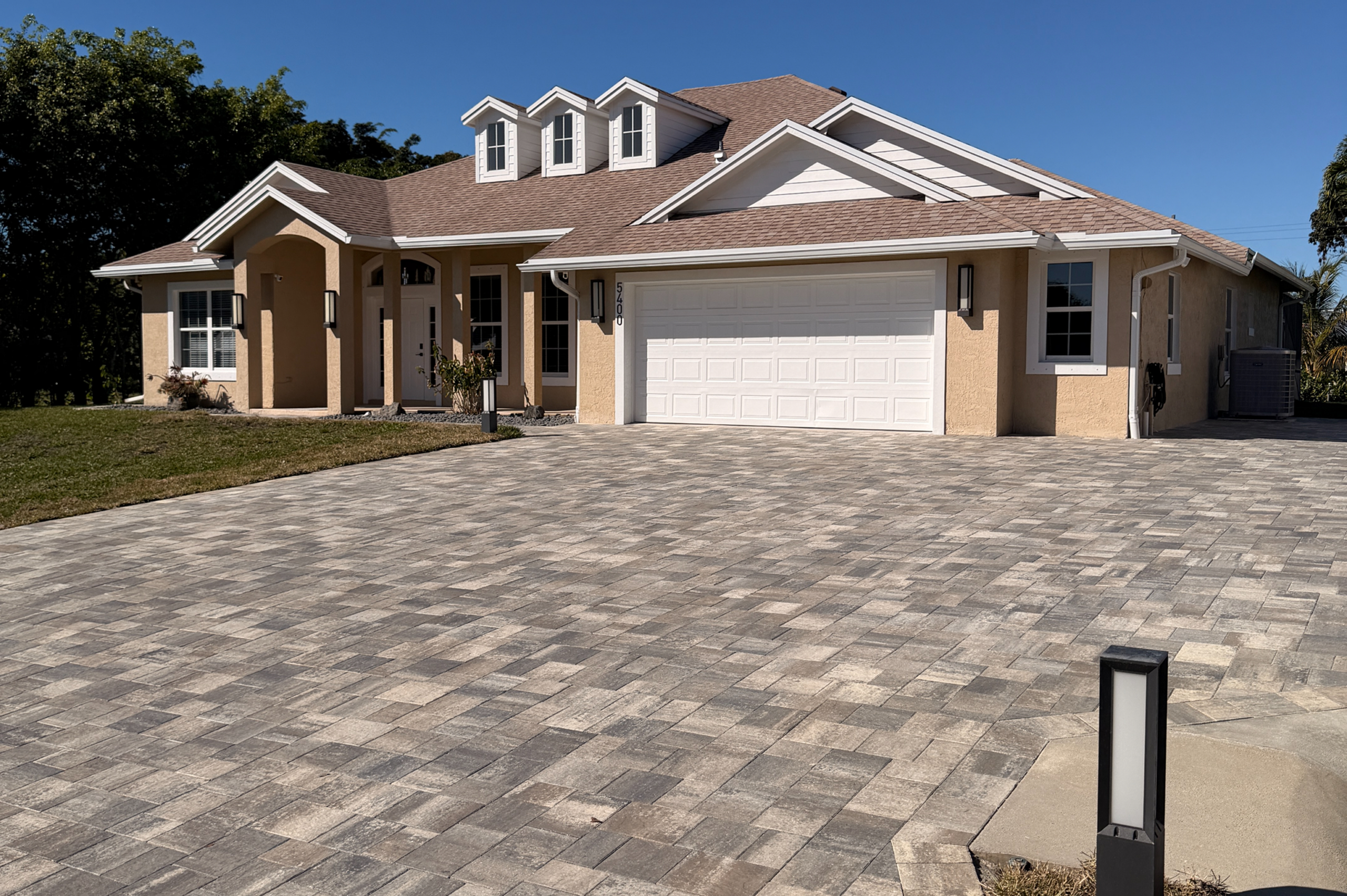 5400 STERLING - Paver Driveway after Venice Commercial Services concrete and construction project in Port St. Lucie.